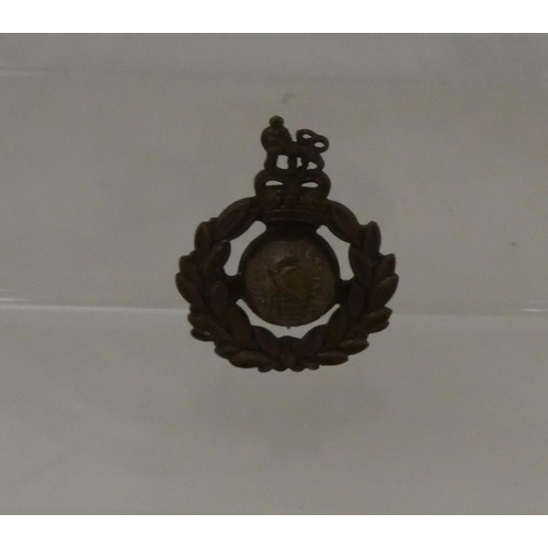 11 - Miscellaneous items to include army cap badge, and Indian bracelet (a/f).