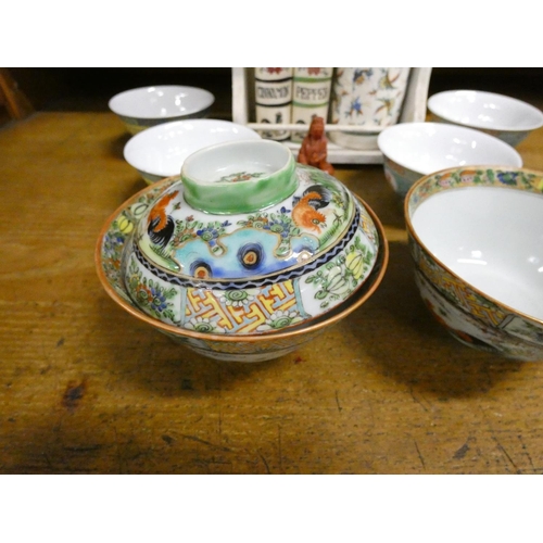 53 - Spice rack and Oriental bowls.