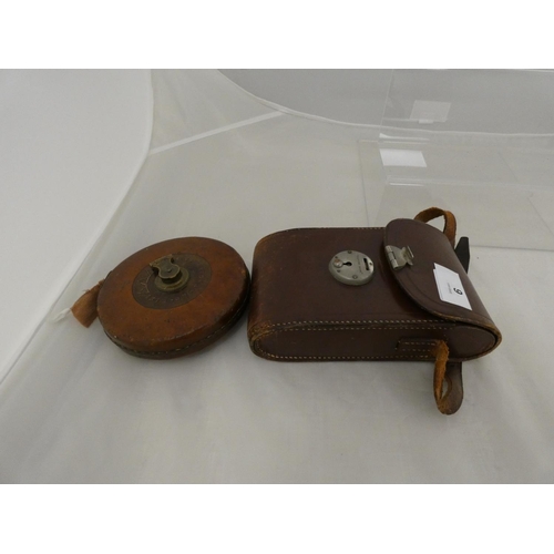 9 - Vintage camera and a tape measure.