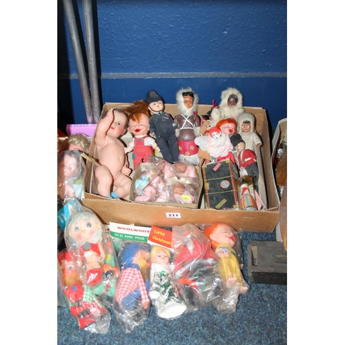 211 - Vintage dolls to include Woolworths Old Man, a Lorini Christmas decoration, a police doll, etc.