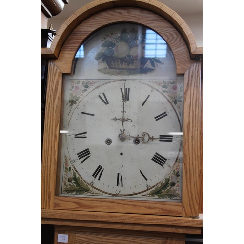 713 - Oak cased grandfather clock with thistle decoration dial.