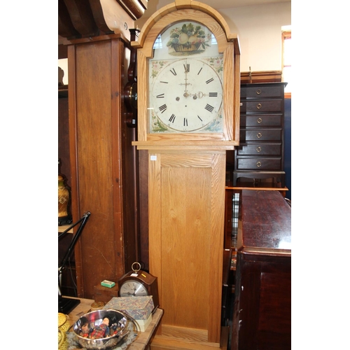 713 - Oak cased grandfather clock with thistle decoration dial.