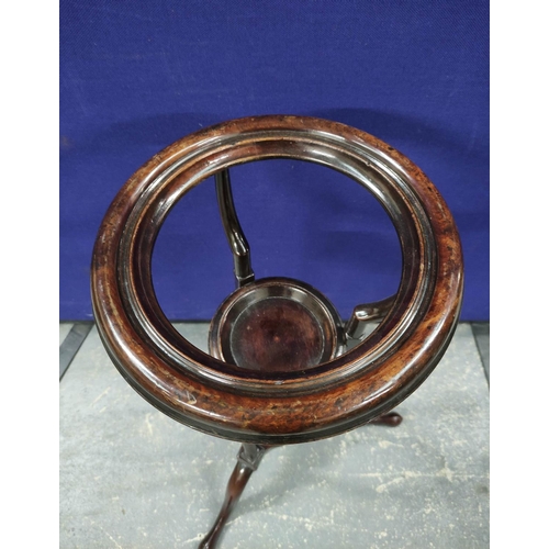 547 - 19th century mahogany wig stand with circular recess above a saucer shelf on spiral columns and trip... 