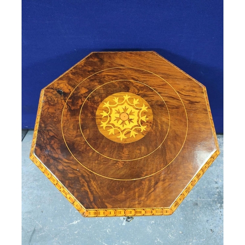 550 - 19th century walnut and mahogany marquetry inlaid sewing table, the octagonal top decorated with a m... 