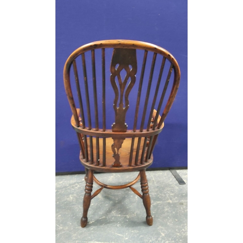 551 - 19th century ash and elm Windsor armchair, with a high hoop spindle back, above a curved solid seat,... 