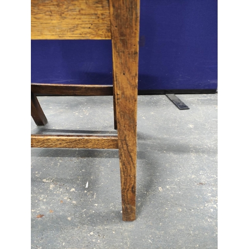 555 - Set of eight Georgian oak country chairs, with fiddle shaped splat backs, on chamfered supports with... 