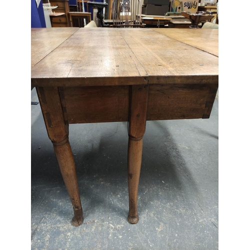 556 - George III style oak gateleg dining table with drop ends, on six pad foot supports, 73cm high, 137cm... 