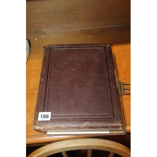 166 - Victorian photograph album containing photographs.