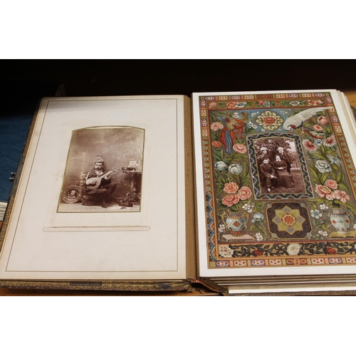 166 - Victorian photograph album containing photographs.