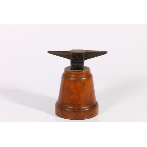 15 - Miniature anvil model, mounted on wooden base, 9cm.