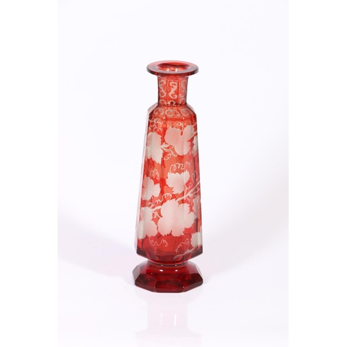 46 - Flash-cut ruby glass faceted vase, decorated with grapevine.