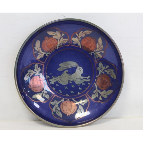 190 - Jonathan Chiswell Jones East Sussex studio pottery plate with central panel of a running hare surrou... 