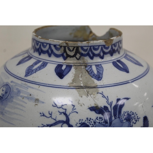 194 - 18th century blue and white Delft vase of baluster form decorated in the Chinese manner with continu... 