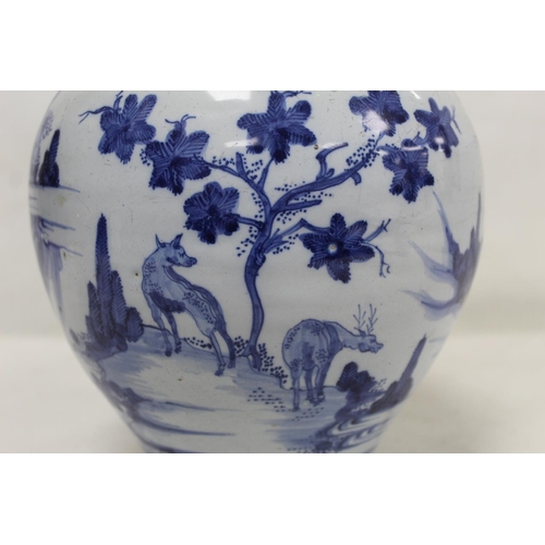 194 - 18th century blue and white Delft vase of baluster form decorated in the Chinese manner with continu... 