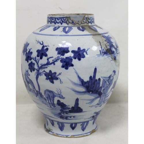 194 - 18th century blue and white Delft vase of baluster form decorated in the Chinese manner with continu... 