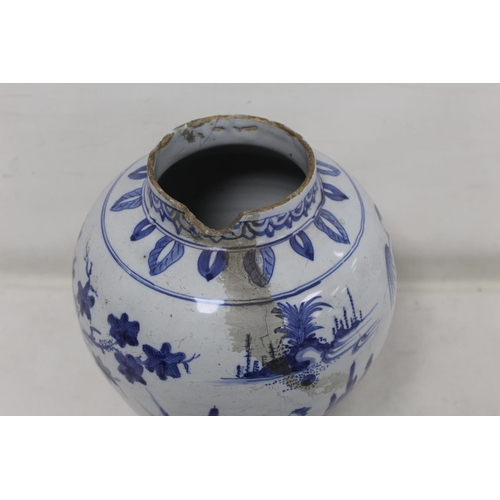 194 - 18th century blue and white Delft vase of baluster form decorated in the Chinese manner with continu... 