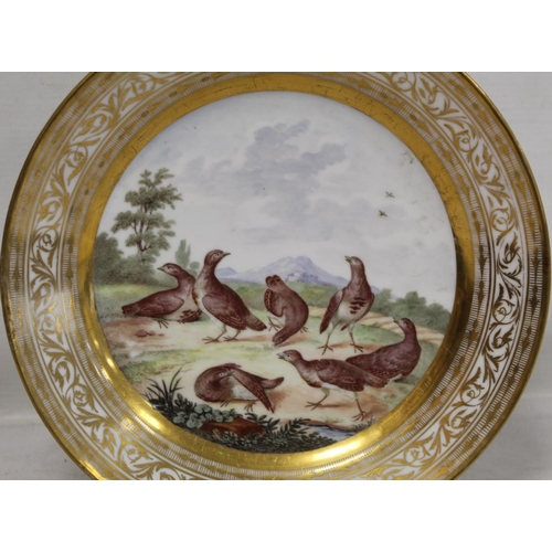 200 - 19th century Continental porcelain plate of circular form, the central hand painted polychrome panel... 