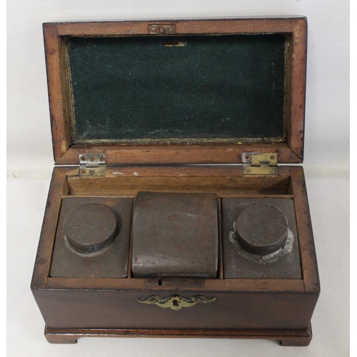 204 - Georgian mahogany tea caddy of rectangular form on four bracket feet with single brass swing handle ... 