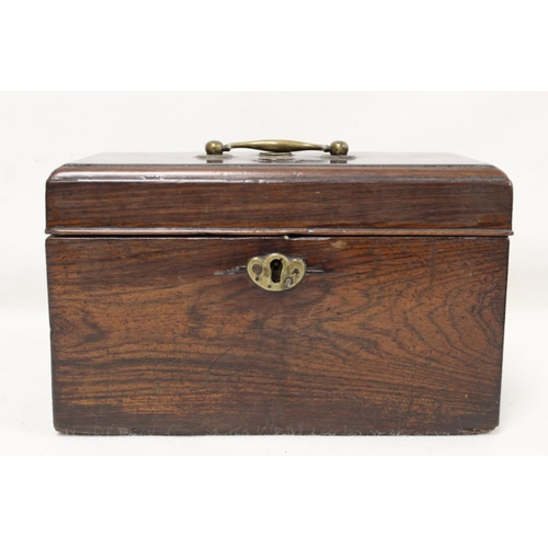 205 - Georgian rosewood tea caddy of rectangular form with single brass swing handle, inlaid brass roundel... 