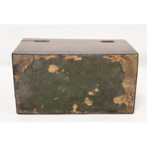 205 - Georgian rosewood tea caddy of rectangular form with single brass swing handle, inlaid brass roundel... 