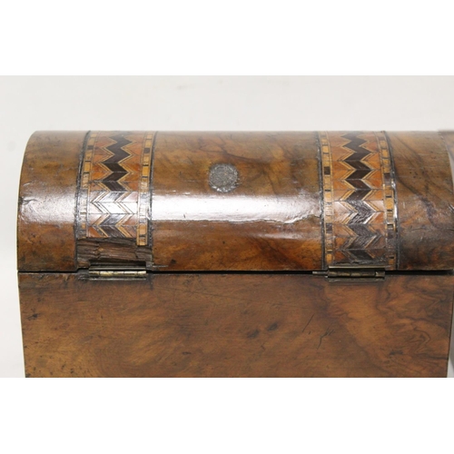 207 - Victorian burr walnut tea caddy of domed rectangular form with marquetry banding, the interior with ... 