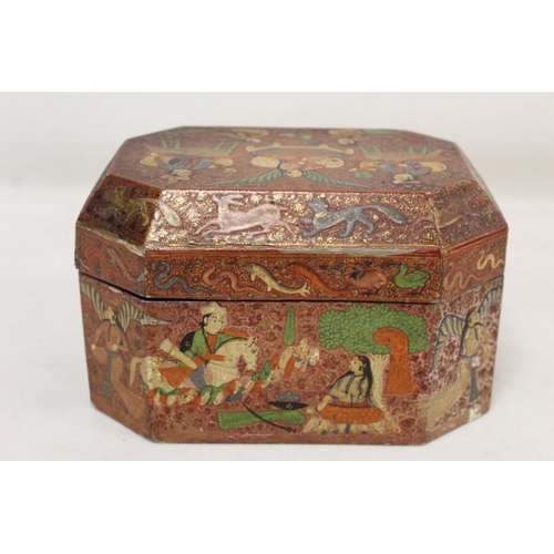 208 - 19th to early 20th century Indian painted wooden box of canted rectangular form with panels of figur... 