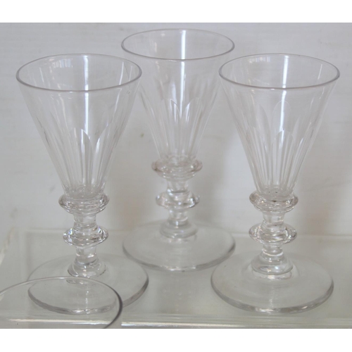 212 - Collection of fifteen antique drinking glasses including: a pair of flutes with faceted trumpet bowl... 