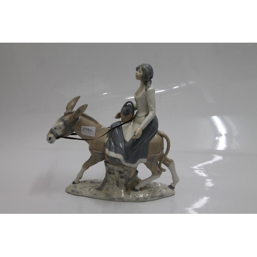 299a - Rex of Valencia porcelain figure of a girl on a donkey.