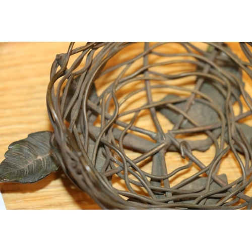 124 - Indian stone set model of a bird and a bronzed sculpture of a bird nest.