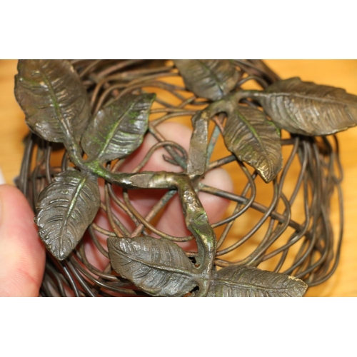 124 - Indian stone set model of a bird and a bronzed sculpture of a bird nest.