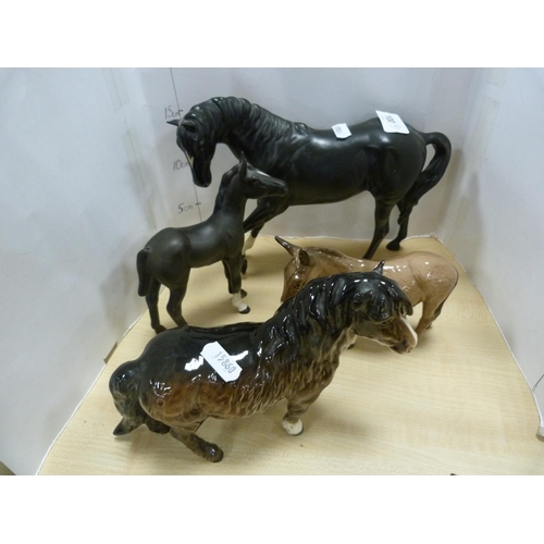 100 - Four assorted Beswick horse figures including Shetland pony, one glazed in black, smaller black glaz... 