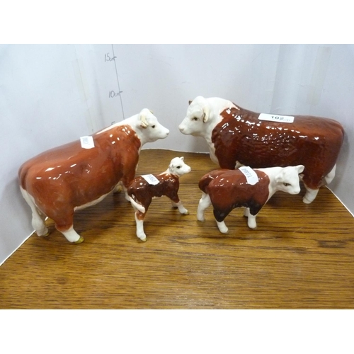 102 - Set of four Beswick cow figures including 'Champion of Champions'.