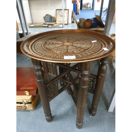 109 - Copper Benares-style table on folding stand, Stabilo crayon set, similar wooden box.