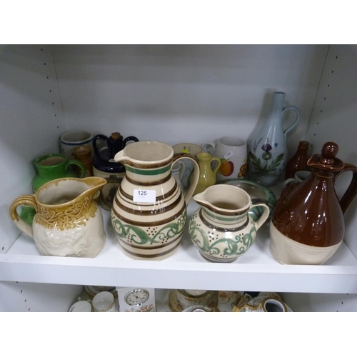 125 - Collection of Buchan Ware pottery jugs, decanters with stoppers, flagons with stoppers, preserve pot... 