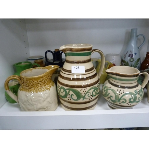 125 - Collection of Buchan Ware pottery jugs, decanters with stoppers, flagons with stoppers, preserve pot... 