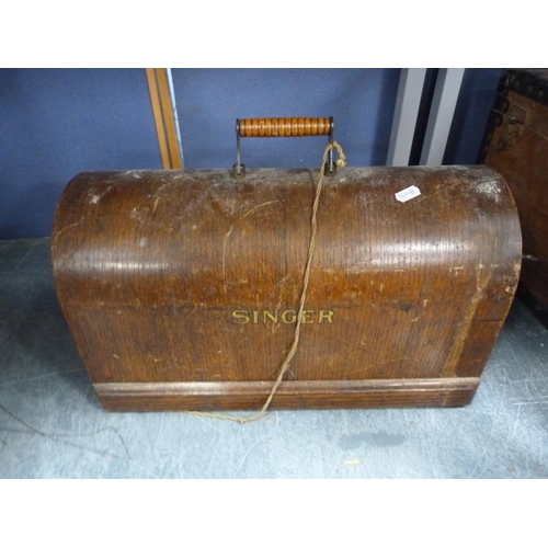 19 - Singer portable sewing machine in oak case, no. Y1618846.