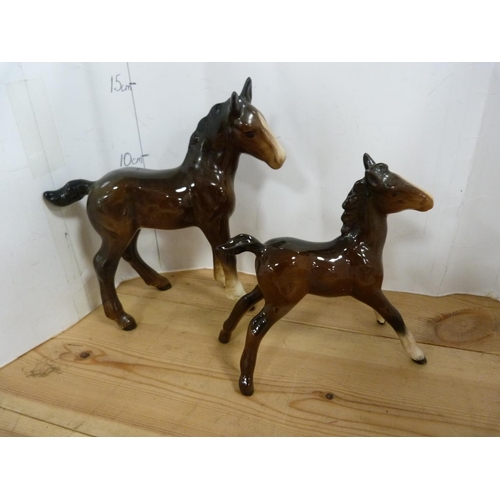 78 - Four assorted Beswick horses and foals including a large figure and three smaller figures.  (4)