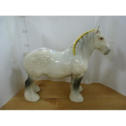 81 - Four Beswick dapple grey horses of various sizes including Arab Xayal, no. 1265.  (4)