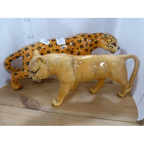 84 - Beswick figure of a leopard and another Beswick figure of a lioness.  (2)