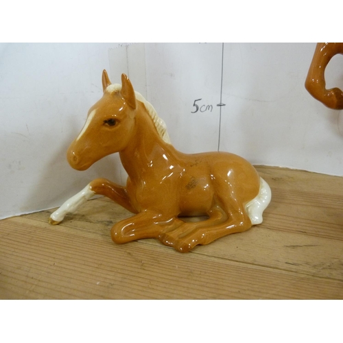 87 - Four assorted Beswick horses, glazed in tan, various sizes.  (4)