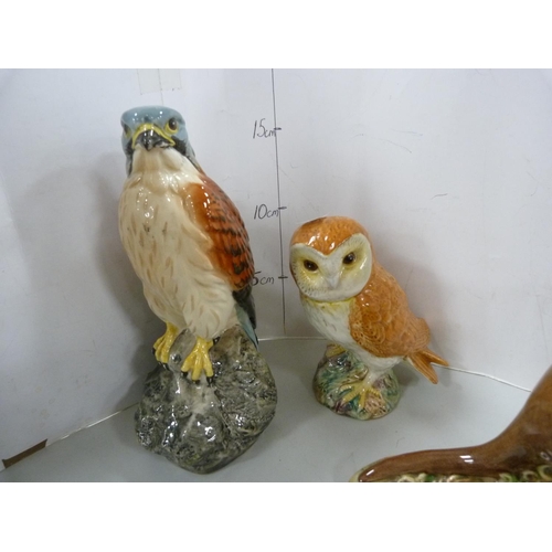 89A - Beswick figures of owls, kangaroo, otter, panda etc.