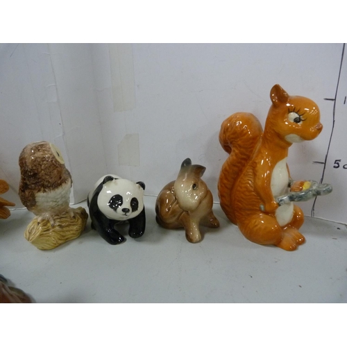 89A - Beswick figures of owls, kangaroo, otter, panda etc.