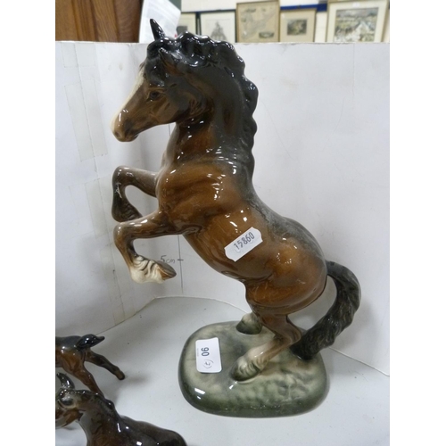 90 - Beswick figure of rearing horse, no. 1014, also six assorted Beswick foals and ponies.  (7)