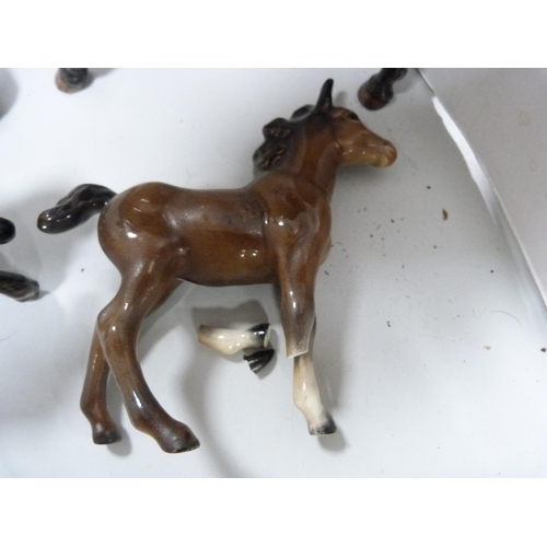 90 - Beswick figure of rearing horse, no. 1014, also six assorted Beswick foals and ponies.  (7)