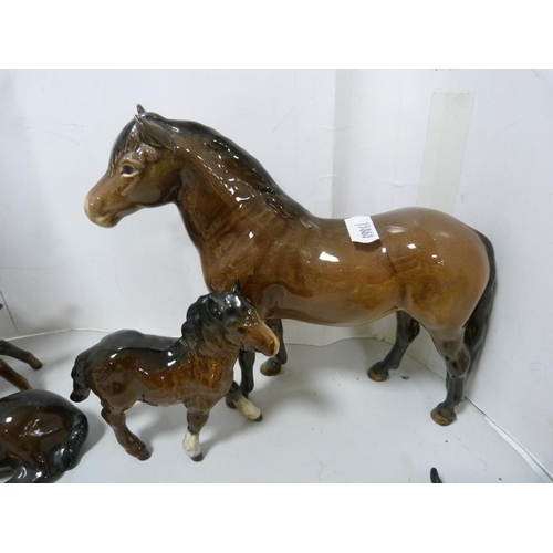 90 - Beswick figure of rearing horse, no. 1014, also six assorted Beswick foals and ponies.  (7)