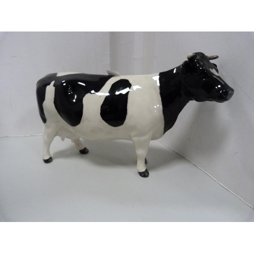 92 - Two Beswick Friesian cows, 'Coddington Hilt Bar' and 'Claybury Legwater'.