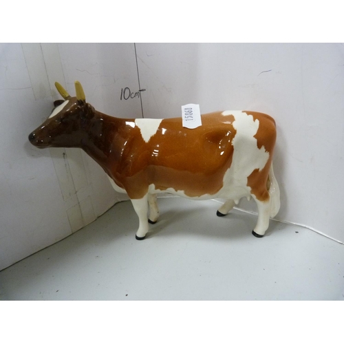 94 - Four Beswick figures including ram, calf, 'Dunsley Cottoy' cow and another cow, 'Ch. Ickham Bessie'.... 