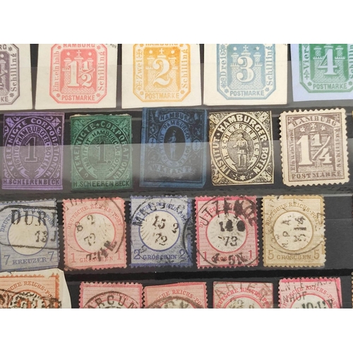 261 - World. Three postage stamp albums arranged alphabetically by country ranging from the French Colonie... 