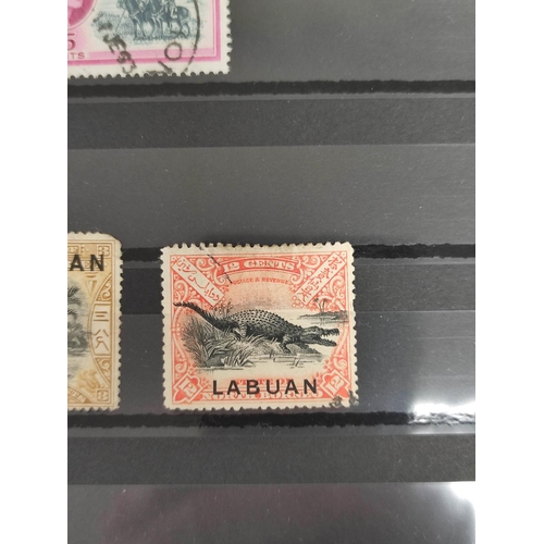 262 - British Commonwealth & World. Three postage stamp albums arranged alphabetically by country rang... 