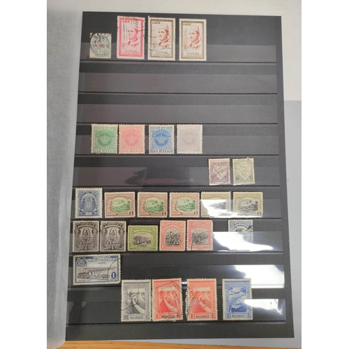 263 - World. Three postage stamp albums arranged alphabetically by country ranging from Latvia to Yugoslav... 